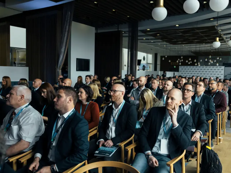 An audience seated in rows