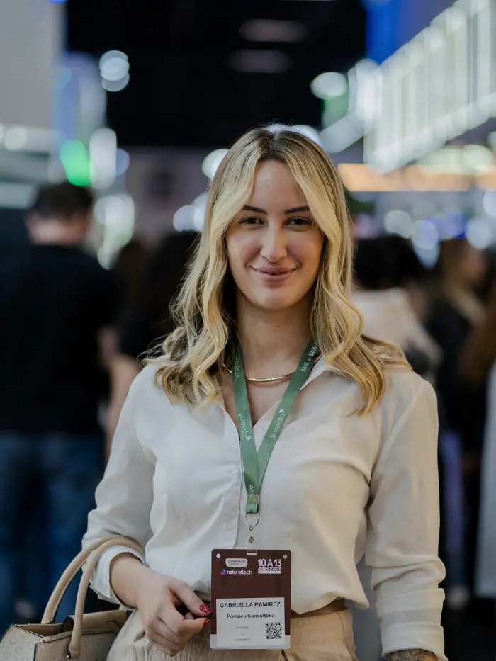 An attendee wearing a conference badge